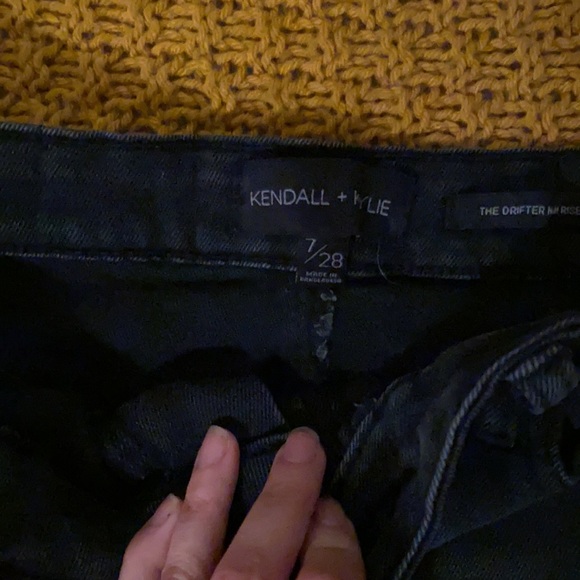 New and never worn. Short, back jean shorts with a folded raw hem. - Picture 2 of 2